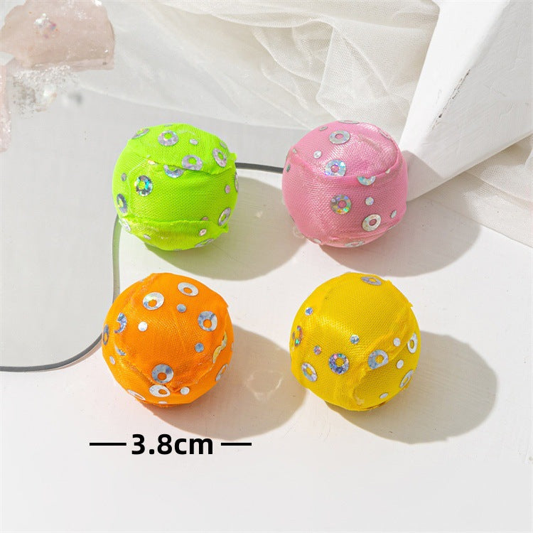 Jingle Bell Cat Teaser Ball - lifestyle photo